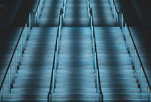 blue empty concrete stairs with metal handrail san diego